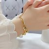 Női Nemesacél Arany Színű Nail Karkötő  18CM